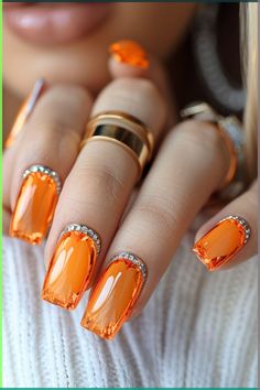 This beautiful design adds a ray of sunshine to your nails! Vibrant orange nail color is ideal for injecting warmth and liveliness into any outfit. Save this for your next bright summer nail inspiration! Orange And Green Nail Designs, Clemson Nails, Orange Nail Color, Nails Vibrant, Orange Ombre Nails, Best Summer Nail Color, Summer Nail Colors, Orange Nail Designs, Summer Nail Ideas