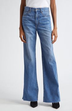 A high waist counterbalances the wide-leg silhouette of nonstretch jeans crafted in the USA with plenty of pockets and raw, frayed hems. 32 1/2" inseam; 22" leg opening; 13" front rise; 14 1/2" back rise (size 29) Zip fly with button closure Five-pocket style 100% cotton Machine wash, line dry Made in the USA Denim Wide-leg Flare Jeans With Frayed Hem, Wide-leg Denim Flare Jeans With Frayed Hem, Denim Flare Jeans With Frayed Hem And Wide-leg, High Rise Cotton Wide Leg Pants With Frayed Hem, Wide Leg Jeans With Frayed Hem For Work, Medium Wash Wide Leg Cotton Flare Jeans, Classic Wide Leg Jeans With Frayed Hem, High Waist Flare Jeans With Frayed Hem For Work, Flared Wide Leg Denim Pants With Pockets