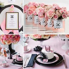 the table is set with pink flowers and black plates, napkins, and place settings