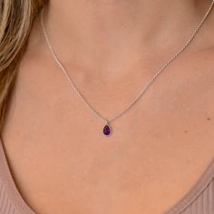 This dainty purple Amethyst pendant necklace has a delicate silver chain. The chain is solid sterling silver 925., and there is an extension so that the size can be adjusted. There are different stonees to choose from. The stones are natural stones and no 2 are identical, but they are similar. If you would like a custom order or have any questions please contact me, thanks. Purple Birthstone Teardrop Pendant Necklace, Purple Teardrop Birthstone Necklace, Sterling Silver Purple Gemstone Birthstone Necklace, Purple Gemstone Birthstone Necklace In Sterling Silver, Purple Sterling Silver Birthstone Necklace, Minimalist Purple Pendant Necklace, Purple Sterling Silver Teardrop Pendant Necklace, Purple Teardrop Pendant Necklace In Sterling Silver, Amethyst Birthstone Necklace