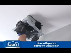 a man is fixing an exhaust fan on the ceiling in his house, with text overlay that reads how to replace a bathroom exhaust fan