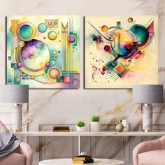 two paintings on the wall in a living room, one is colorful and the other is abstract