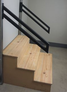 the stairs are made of wood and metal