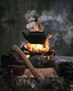 a kettle is on fire in the woods