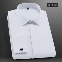 Elegant White French Cuff Shirt Elevate your style with our men's long-sleeve French cuff dress shirt. Perfect for weddings, business, or any occasion that demands a touch of romantic sophistication. Discover timeless elegance and impeccable fit in this classic white shirt. SPECIFICATIONS Style: England Style Sleeve Style: Regular Sleeve Length(cm): Full Shirts Type: Dress Shirts Place Of Origin: China (Mainland) Pattern Type: Solid Origin: Mainland China Model Number: BST-5-539 Material: COTTON Dress Shirts Men, French Cuff Dress Shirts, Men Party, French Cuff Shirts, Fashion Stand, Classic White Shirt, Social Dresses, Man Party, Tuxedo Shirts