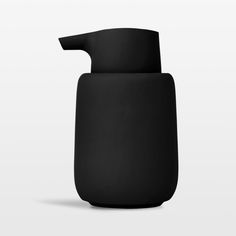 a black soap dispenser on a white background