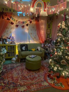 a living room decorated for christmas with lights on the ceiling and decorations hanging from the ceiling