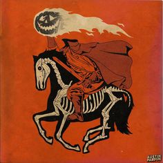 a skeleton riding on the back of a horse