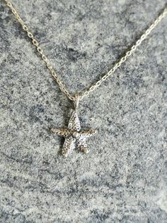 "Tiny sterling silver starfish pendant. The sterling silver charm is a dainty 9mm with a shiny finish. It has a delicate sterling silver chain and clasp. Shown here in 17\" length. *If you are unsure of the length you need, or would like to wear this item at different lengths, we now offer an adjustable length option! You can add an adjustable end to your necklace using this link: https://www.etsy.com/listing/791277751/necklace-extension-added-to-your All items are gift wrapped and shipped witho Necklace Extension, Starfish Pendant, Starfish Necklace, Solid Gold Jewelry, Jewelry Cleaner, Necklace Sterling Silver, Sterling Silver Charm, Santa Barbara, Silver Charms