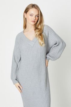 This oversized sweater dress features a flattering v-neck design and a ribbed texture, adding a touch of elegance to its relaxed style. Made with high-quality knit fabric, it offers both comfort and warmth, making it an ideal choice for any occasion. Whether you're heading out for a casual outing or simply lounging at home, this dress will keep you looking effortlessly stylish and feeling snug all day long. Christmas Party Shoes, Oversized Sweater Dress, Tanned Makeup, Dresses V Neck, Sweater Dress Oversized, Oasis Dress, Velvet Clothes, Sequin Outfit, Christmas Party Outfits