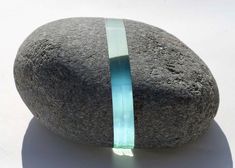 a rock with a thin band on it