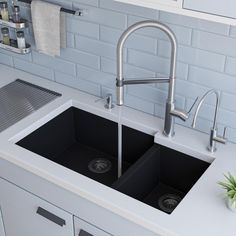 a kitchen sink with two brown sinks and a faucet in the corner next to it