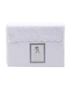 a white bag with lace trimmings on the side and a label that says,