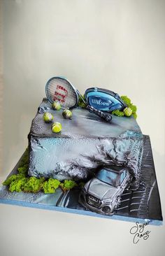 there is a cake that looks like a car and tennis racket