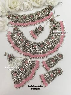 Premium Quality Silver and Pink Pakistani choker and necklace combo set/Pakistani Bridal set/Zircon/Indian jewelry/ Pakistani bridal set This elegant bridal set comes with Necklace, Choker, Earrings, and Jhoomer/ Passa and tikka. Standard shipping/delivery timeline Below are the estimated delivery times after the order is shipped/dispatched.  ---> USA delivery timeline * 2-6 business days to major urban centers in USA. It may take 1-2 days extra to remote locations ---> Canada delivery timeline  * 2-3 business days - GTA  & Montreal  * 2-4  business days - Rest of Ontario/Quebec * 2-6 business days-  Rest of Canada (Please consider 1-2 extra business days to very remote locations)    ---> Europe/Middle East timeline * 5-10 business days We kindly request to consider minor variations in col Wedding Kundan Jewelry Sets With Rose Cut Diamonds, Multicolor Multi-stone Jewelry Sets For Wedding, Luxury Hand-set Rose Gold Bridal Necklace, Festive Multicolor Multi-stone Bridal Necklace, Luxury Multi-stone Bridal Necklace For Festive Occasions, Necklace Combo, Urban Center, Premium Quality, Pakistani Bridal