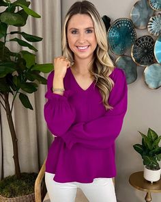 This Autumn Charm Magenta V-neck Top features a classic v-neck, smocked sleeves, and split sides for a comfortable fit. Crafted in a warm magenta hue, this long sleeve top is perfect for transitioning into cooler weather. Magenta Outfit, Formal Top, Spring Refresh, Formal Tops, Navy Outfit, Frou Frou, Cooler Weather, Top Sales, Ladies Boutique