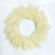 a white fur wreath on a white background