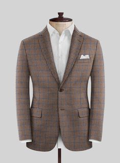 On the hunt for a timeless and fashionable suit that guarantees you'll turn heads? Look no further than our Reda Baez Brown Checks Wool Suit. Crafted from pure wool, it gives you natural warmth and unparalleled comfort, showcasing meticulous craftsmanship. This classic suit is your ticket to making an impression at any event in a professional or social setting.  Look Includes    Reda Baez Brown Checks  Wool  Fabric  Two Button Jacket Style  Notch Lapel   Horn   Brown  Buttons  Single Vent  Three Brown Single-breasted Suit, Brown Wool Three-piece Single Breasted Suit, Brown Double-breasted Suit With Buttons, Brown Fitted Three-piece Suit With Single Button, Brown Wool Single-breasted Suits, Brown Tweed Suit, Grey Tweed Suit, White Linen Suit, Herringbone Jacket