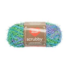 red heart scrubby yarn in blue, green and purple with the words scrubby on it