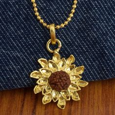 Material :- Brass Antique and Partywear Floral Design Rudraksha Pendant With Chain Care :- It is advisable to store jewellery in a zip lock pouch (air tight pouch), keep away from water perfume and other chemicals and clean it with dry and soft cloth Brass Necklace As Diwali Gift, Navratri Brass Jewelry Gift, Brass Necklace For Diwali Gift, Antique Gold Jewelry For Diwali Gift, Navratri Gold Necklace With Oxidized Finish, Antique Gold Jewelry Gift For Diwali, Antique Gold Necklace With Tilla For Gifts, Gold Necklace For Navratri Gift, Antique Gold Tilla Jewelry As Gift