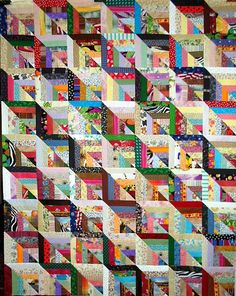 a very colorful quilt that is on display