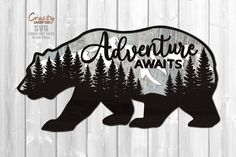 a bear with the words adventure awaits on it's back and trees in the background