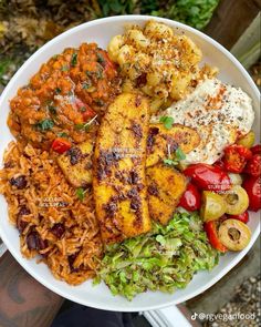 a white plate topped with different types of food