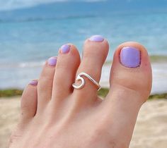 This solid 925 Sterling Silver Wave toe ring is a must for beach lovers. The Wave ring is open at the back so that you can easily adjust it to your toe and get the best fit. You can also wear it as a midi finger ring, pinky ring or finger top ring. Great gift idea for loved ones or for yourself. 👉🏼Features: ♥ Hypoallergenic. 100% nickel-free and lead-free. ♥ Material: 925 Sterling Silver. 🎁 Packaging ♥ Includes a beautiful box perfect for gifts. ♥ We can add a greeting card upon request. 📣If Dainty Toe Ring For Beach, Summer Toe Ring Jewelry As A Gift, Summer Toe Ring Jewelry Gift, Minimalist Silver Rings For The Beach, Minimalist Open Ring Jewelry For Summer, Summer Beach Midi Rings, Minimalist Toe Ring Jewelry For Beach, Adjustable Dainty Rings For Summer, Dainty Adjustable Rings For Summer