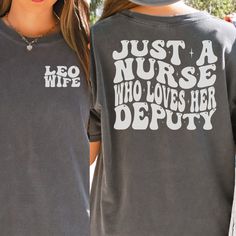 Nurse Life Deputy Wife Comfort Colors T-shirt is the perfect custom gift for a nurse who is also a law enforcement officer's wife or wife to be!  If you want the front pocker personalized with your last name, enter it in the personalization box. (Ex: Mrs. Jackson)  If left blank, "LEO wife" will print on the front of the shirt. This shirt runs true to size.  If you want an oversized look, please order one size up.  If you want the oversized dress look, please size up two sizes. This is made with Wound Care Nursing, Police Wife Shirt, Lineman Wife, Wife Shirts, Leo Wife, Fire Wife, Wife To Be, Police Wife, Comfort Colors Tshirt