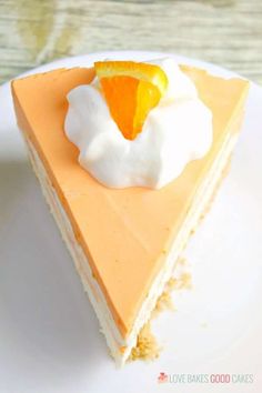 a slice of orange cheesecake on a white plate