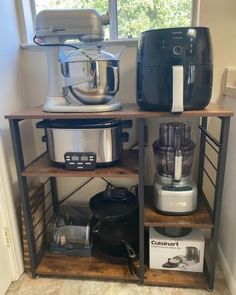 there are many different types of appliances on this shelf