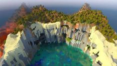 an aerial view of a mountain lake surrounded by trees and cliffs with blue water in the foreground