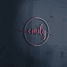 the word'emly'written in cursive writing on a dark background