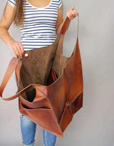 Cognac Oversized bag Large leather tote bag, Every Day Bag, Women leather bag Slouchy Tote, Cognac Handbag for Women,  Soft Leather Bag by COMBAG on Etsy https://www.etsy.com/listing/621823550/cognac-oversized-bag-large-leather-tote Slouchy Tote, Leather Tote Bag Women, Large Leather Tote Bag, Soft Leather Bag, Stylish Tote Bag, Oversized Bag, Large Leather Tote, Brown Handbag, Leather Handbags Tote