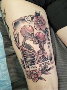 a woman's thigh with a tattoo on it that says, the lover is