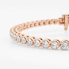 We think a three-prong approach is better than two! Each of these sparkling round lab grown diamonds is held securely with three-prongs, to give it a minimalist and classy style. A tennis bracelet that is sure to attract attention. Rose Gold Diamond Tennis Bracelet With Prong Setting, Rose Gold Diamond Tennis Bracelet With Round Cut, Rose Gold Diamond Round Cut Tennis Bracelet, Rose Gold Round Cut Diamond Tennis Bracelet, Rose Gold Tennis Bracelet With Diamond Accents, Rose Gold Tennis Bracelet With Prong Setting, Rose Gold Tennis Bracelet With Vvs Clarity, Fine Jewelry Rose Gold Tennis Bracelet With Prong Setting, Rose Gold Brilliant Cut Diamond Bracelet For Anniversary