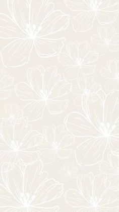 a white flower pattern on a beige background