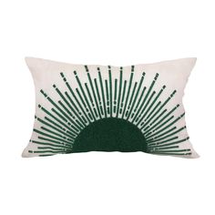 a green and white pillow on a white background