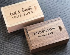 two personalized wooden business cards on top of each other, with the date and time engraved on them