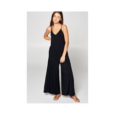 This is the perfect throw-on jumpsuit, no matter the occasion. It's composed of a soft knit fabric, making it comfy enough to lounge all day in (which we highly recommend) but it also doubles as your complete night-out attire - just add a belt and throw on some strappy heels! We love a good versatile go-to piece. Made in USA Fitted Casual Strapless Jumpsuit For Loungewear, Black Lounging Jumpsuits And Rompers For Spring, Strappy Jumpsuit, Fabric Making, Strappy Heels, Soft Knits, Large Black, Knit Fabric, Night Out