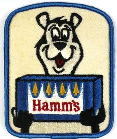 an embroidered patch with the words hamm's on it and a cartoon mouse