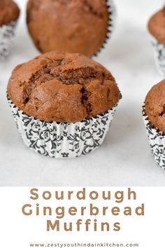 several chocolate muffins with the words sourdough gingerbread muffins