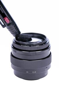 a close up of a camera lens with an extension tube attached to the lens body