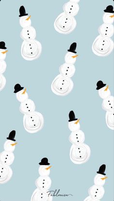 a snowman with a black hat on it's head is surrounded by other snowmen