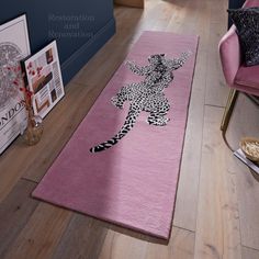 a pink rug with a zebra on it