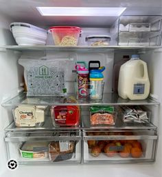 an open refrigerator filled with lots of food