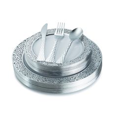 a set of four silver plate with forks and spoons on top of each other