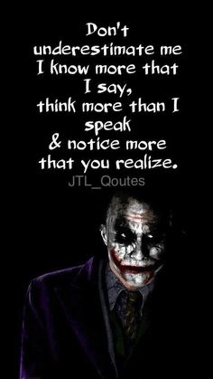 the joker with his face painted in black and white, has a quote on it