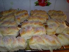 there are many pastries on the tray ready to be baked in the oven and eaten