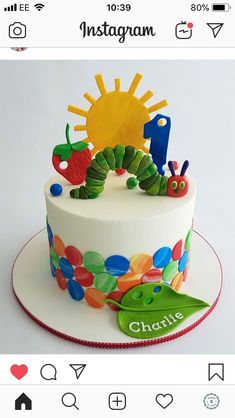 a cake decorated with the very hungry caterpillars